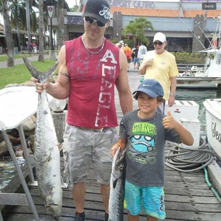 The photo of Dorian Giordano fishing with his father. 